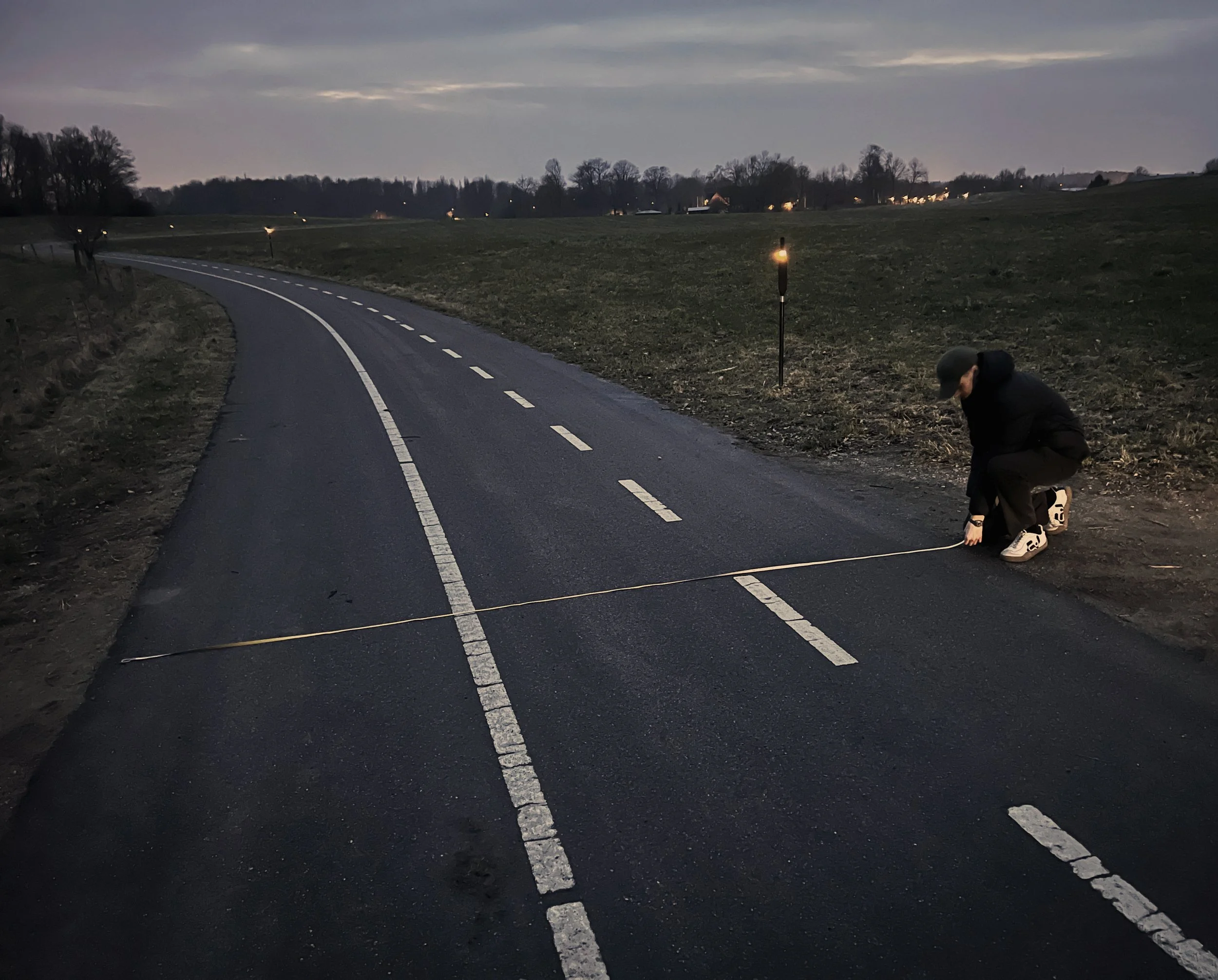 Measuring the path at dusk for the drone survey
