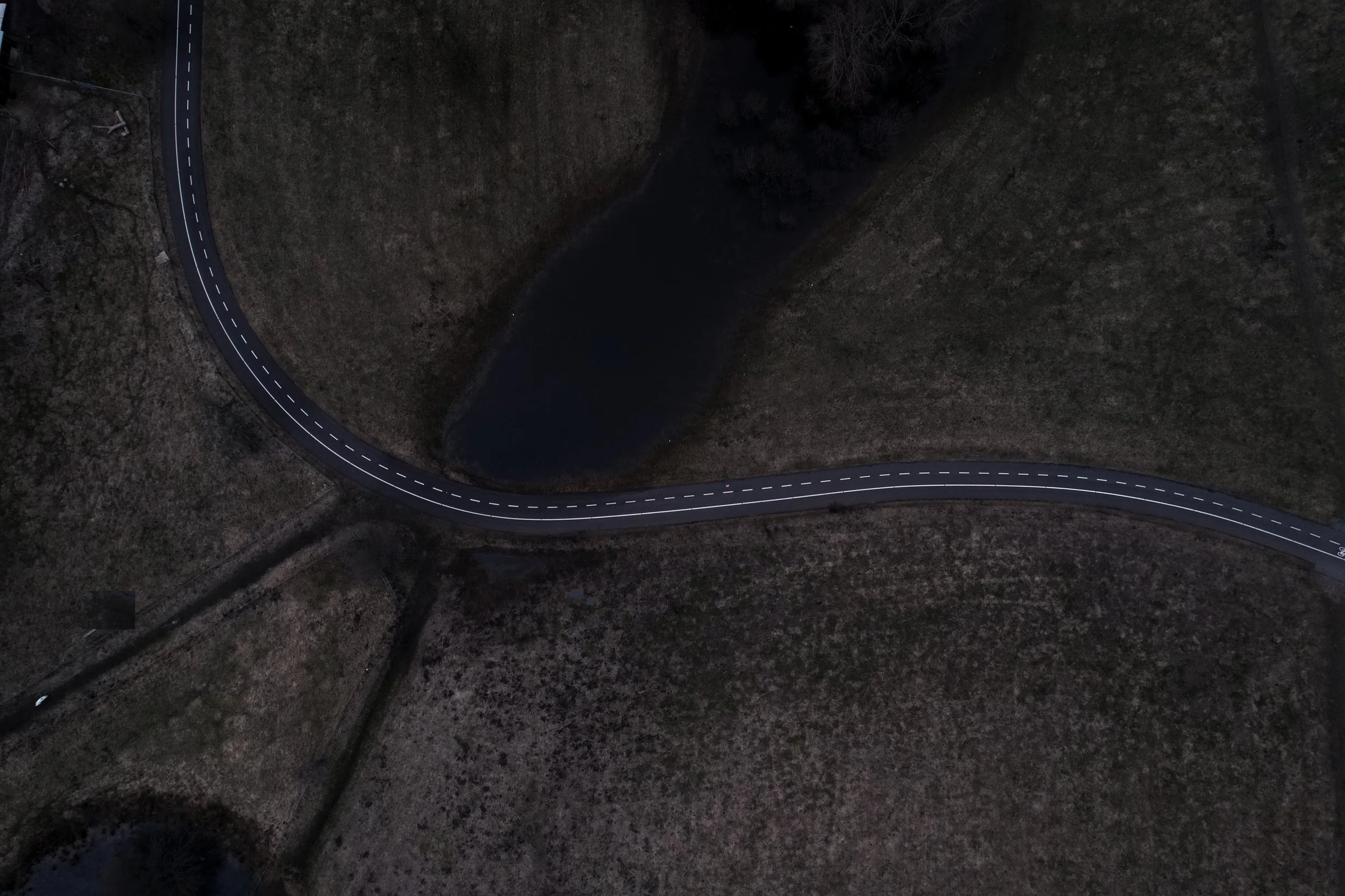 Drone overhead view of the road — before lighting