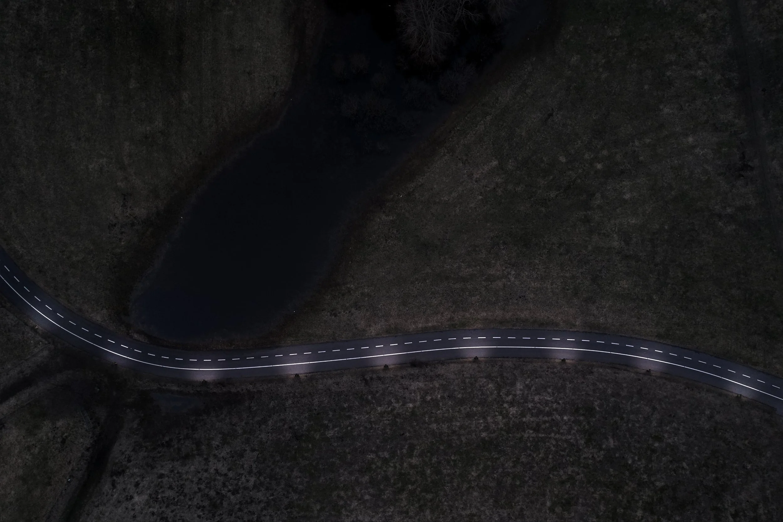 Drone overhead view with simulated SPIK lighting — after
